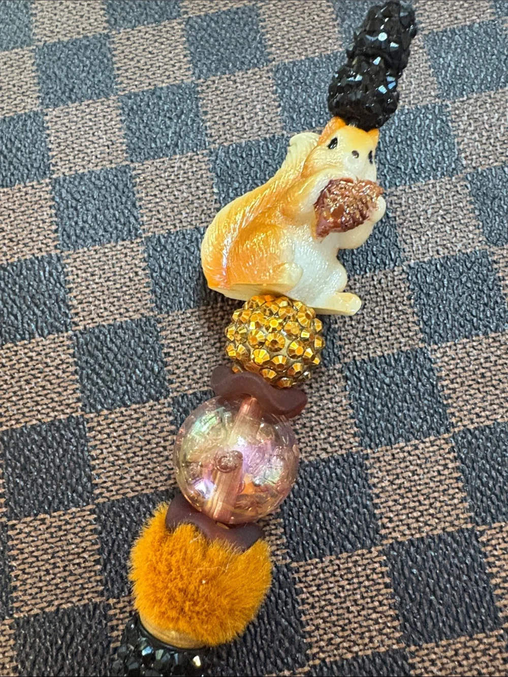 Handcrafted Black Beaded Pen with Orange Squirrel Accent